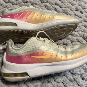 Used condition pink and white Nike sneakers